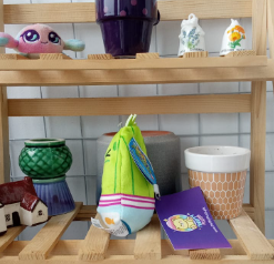 Cats vs Pickles" plush toy,