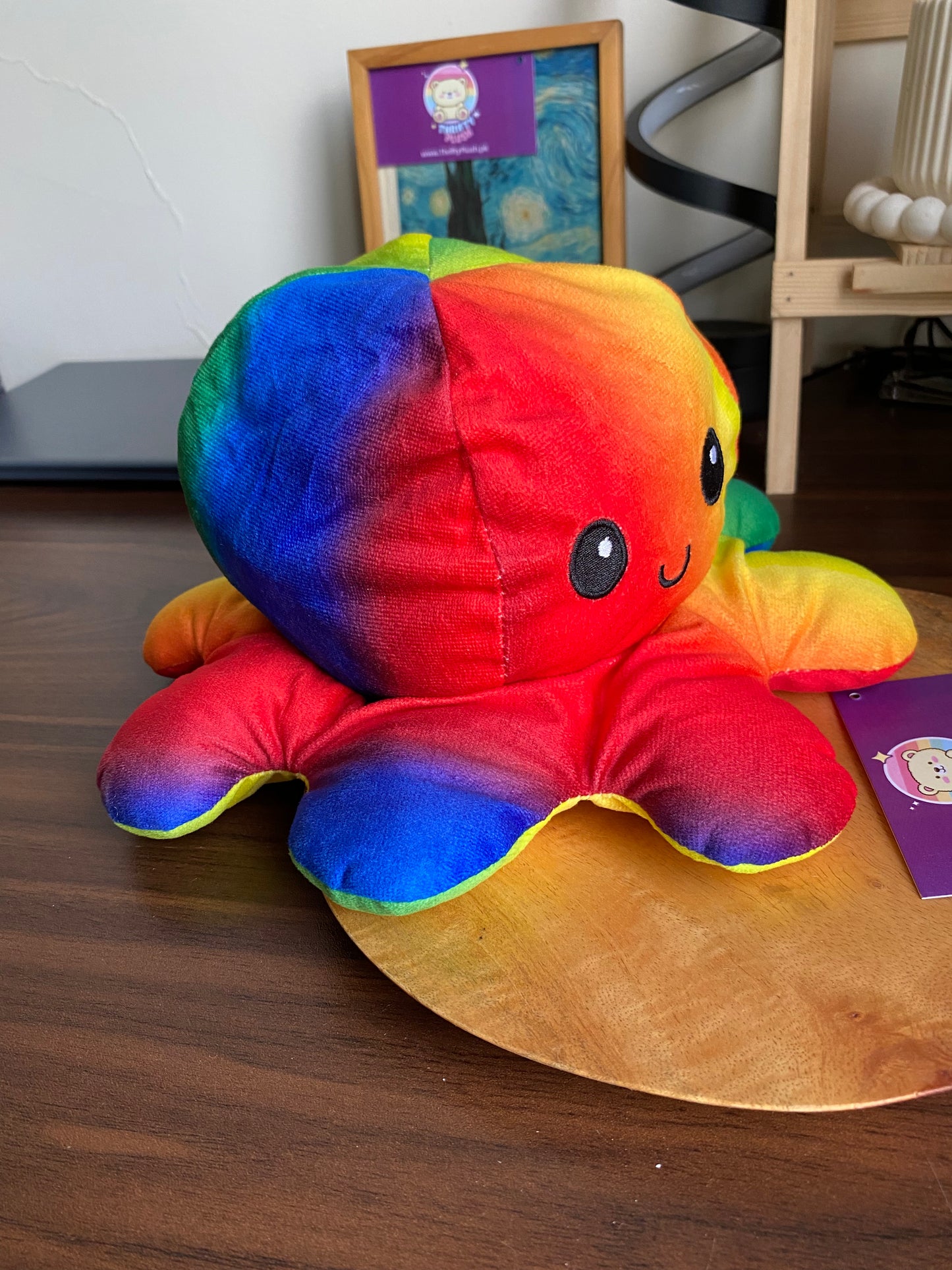 Reversible rainbow octopus plush toy with happy and sad faces, mood changing stuffed animal for kids and stress relief
