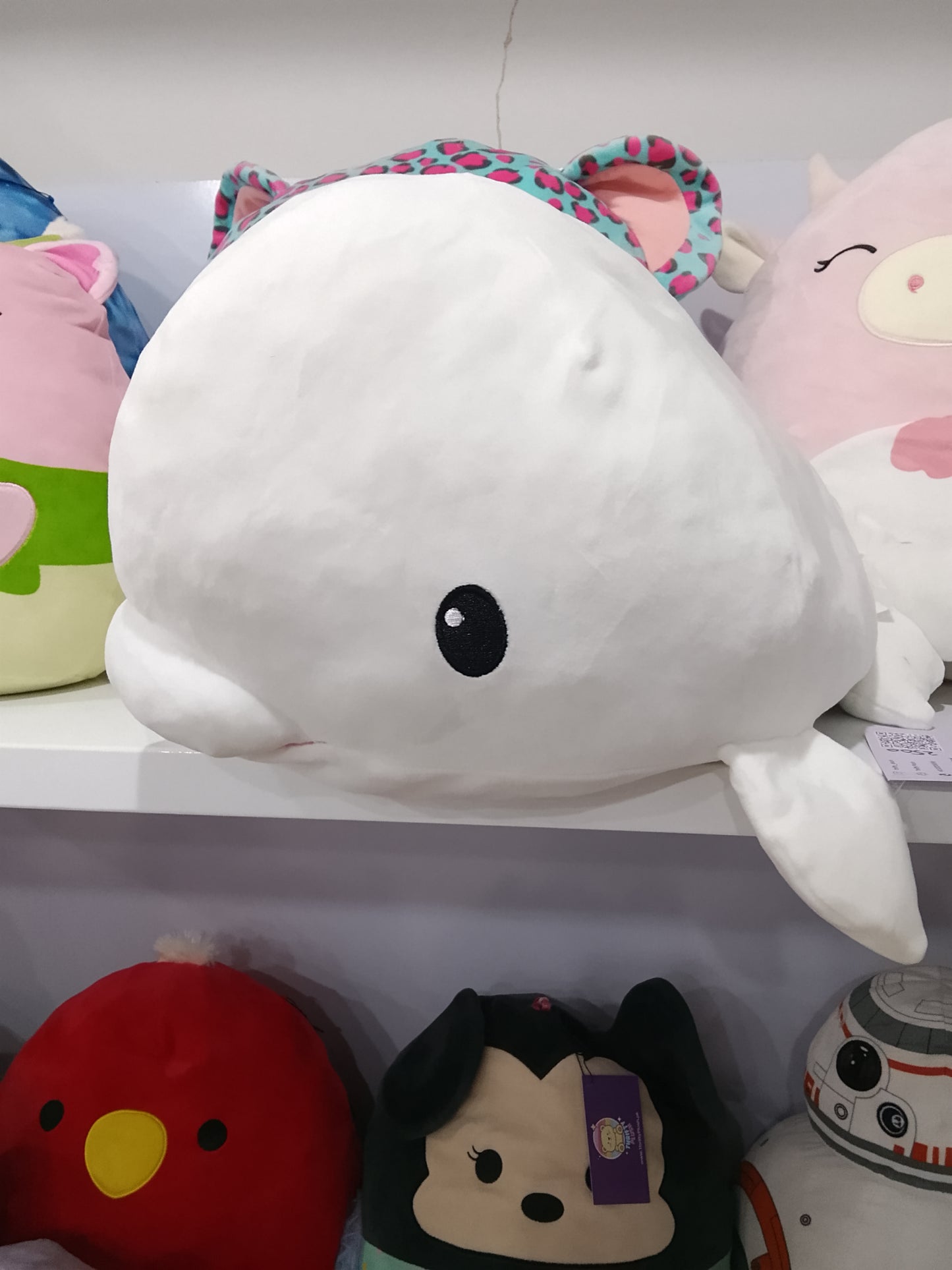 White Beluga Whale plush toy, likely from a collection of sea-themed stuffed animals.