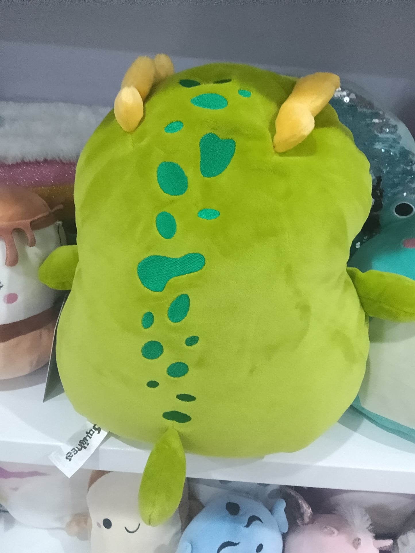 Squishmallows green dinosaur character plush toy