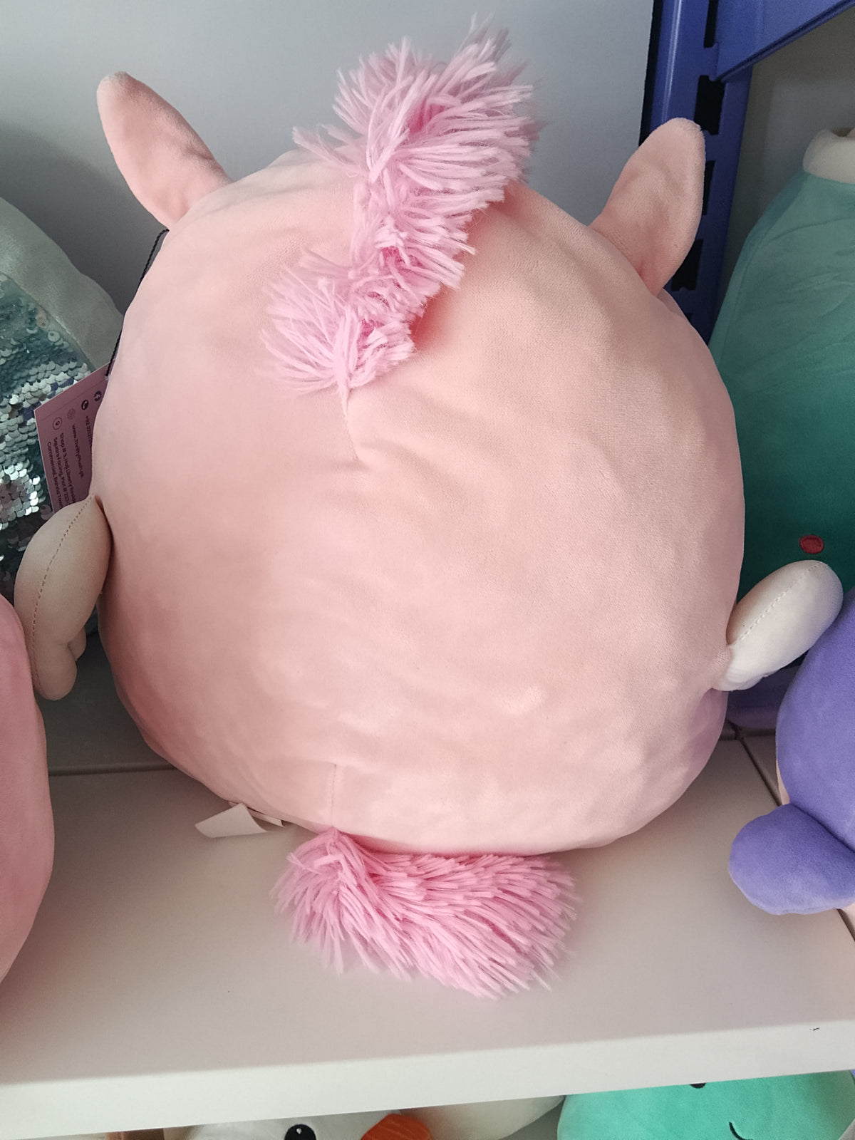 Squishmallows Pandora the Pegasus plush toy.