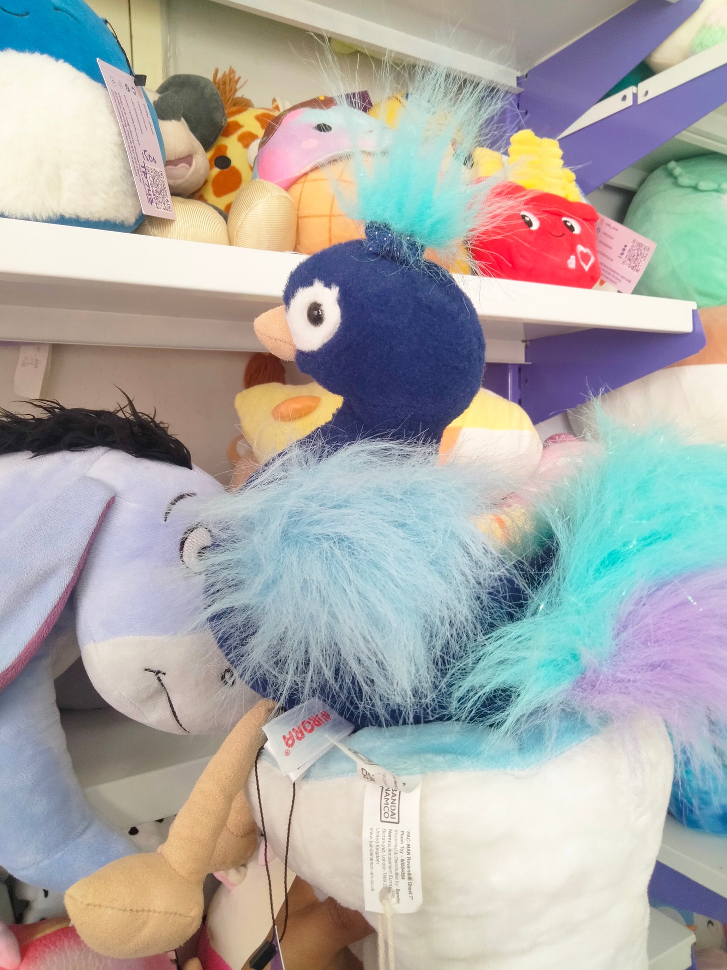 Aurora World Luxe Boutique Mora Peacock stuffed plush toy.