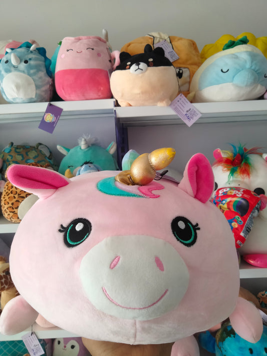 Large pink unicorn plush toy