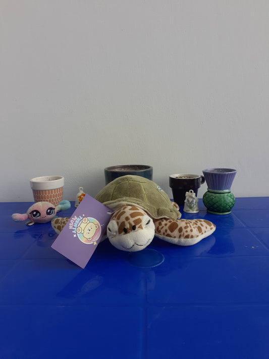 Plushie Resembling Crush, The Sea Turtle From Disney Pixar's