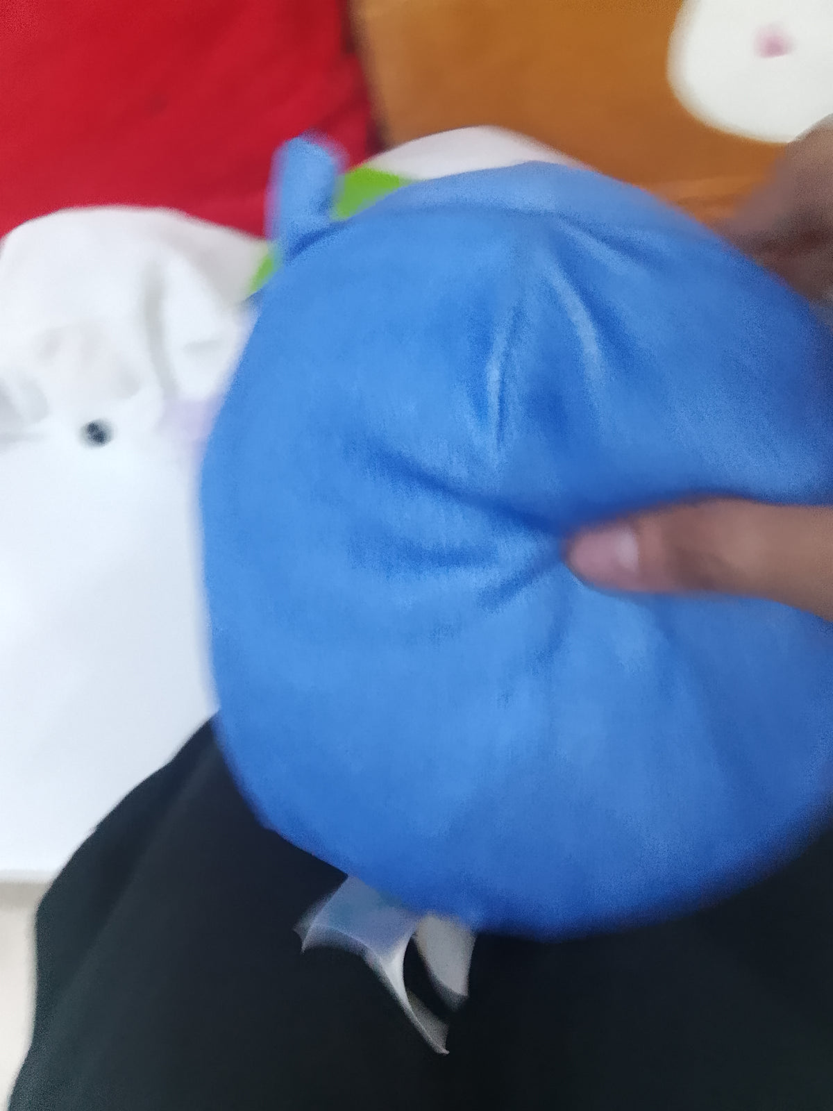 Kellytoy Squishmallows Tadita the Blue Cell Phone plush toy.