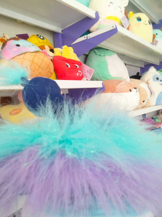 Aurora World Luxe Boutique Mora Peacock stuffed plush toy.