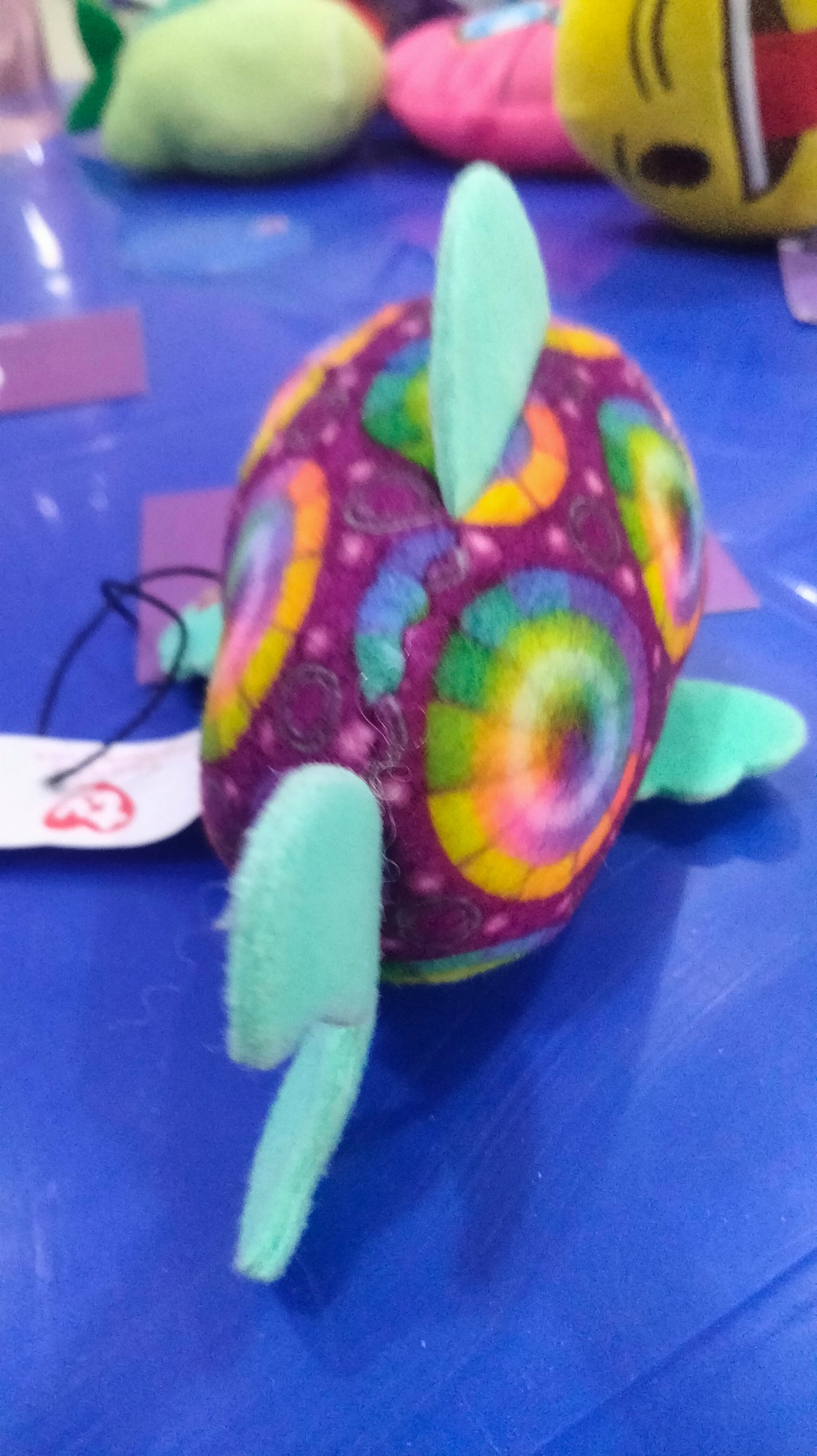 Tys plush fish named Sami, featuring.