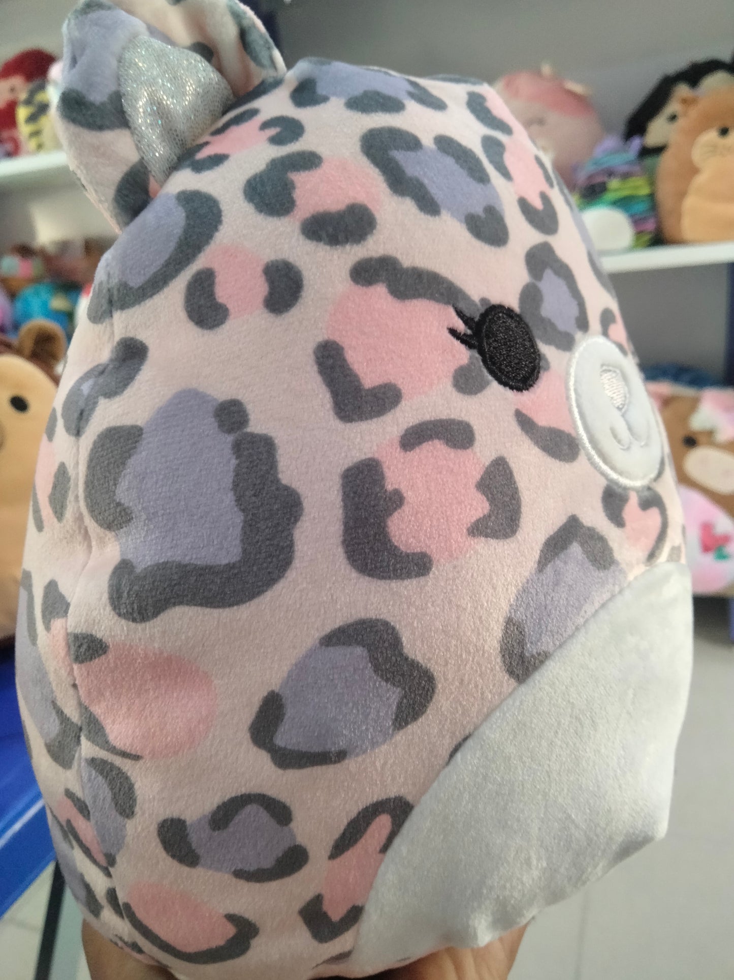 Squishmallows Dallas the Leopard plush toy.