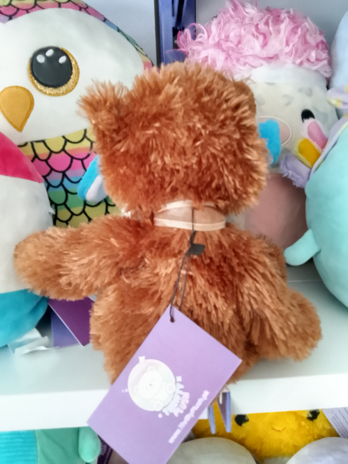 Brown Sugar teddy bear plush toy.