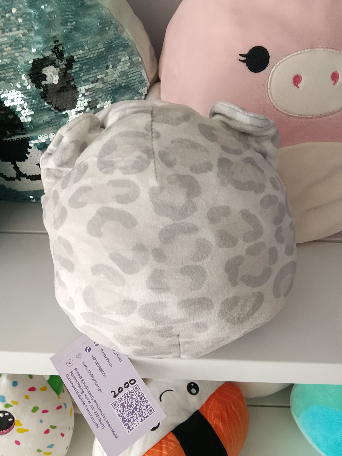 Squishmallows Flip-a-Mallow plush Dohna the Pink Panda and Mischa the Snow Leopard.