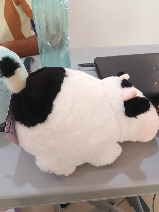 Aurora Spudsters Tutie Cow plush, designed with a rounded, potato-like shape.