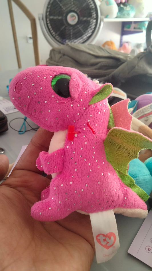 Beanie Boos Darla the Pink Dragon plush toy.