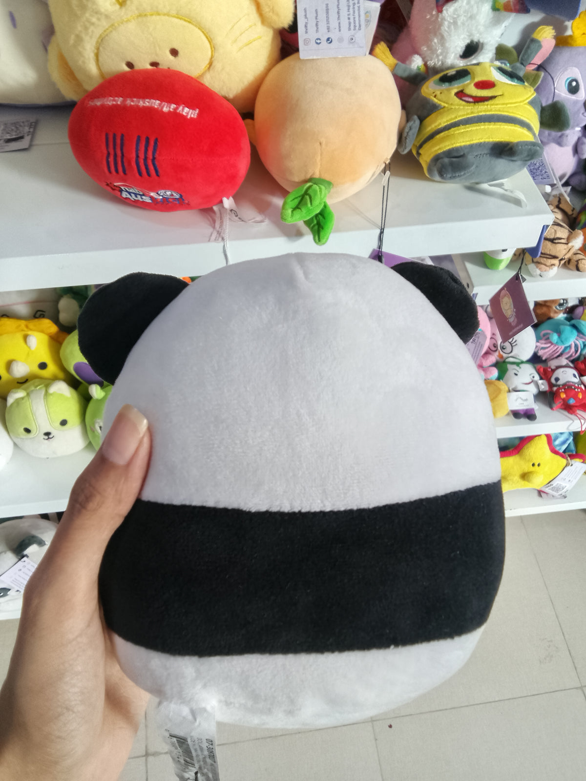 Nici Chill Panda plush toy holding a red heart cushion.