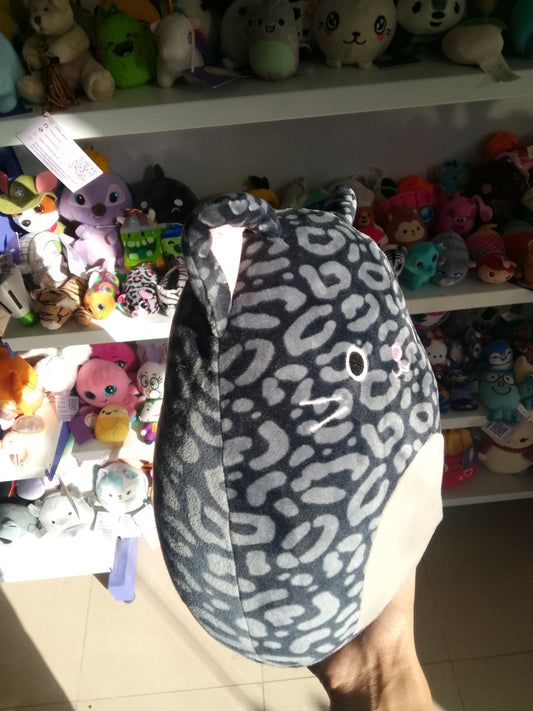 Squishmallows plush toy Xiomara the Black Panther in a grey and black leopard print.