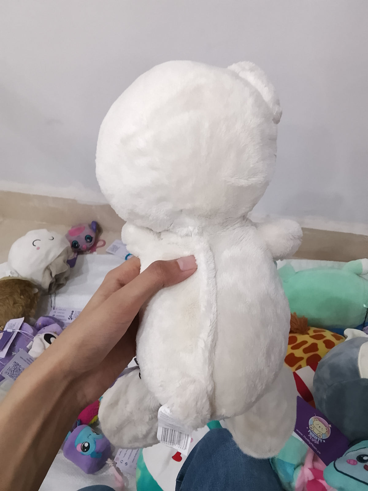 white plush "Hug Me Bear" holding a teal heart embroidered with "Special Mum".