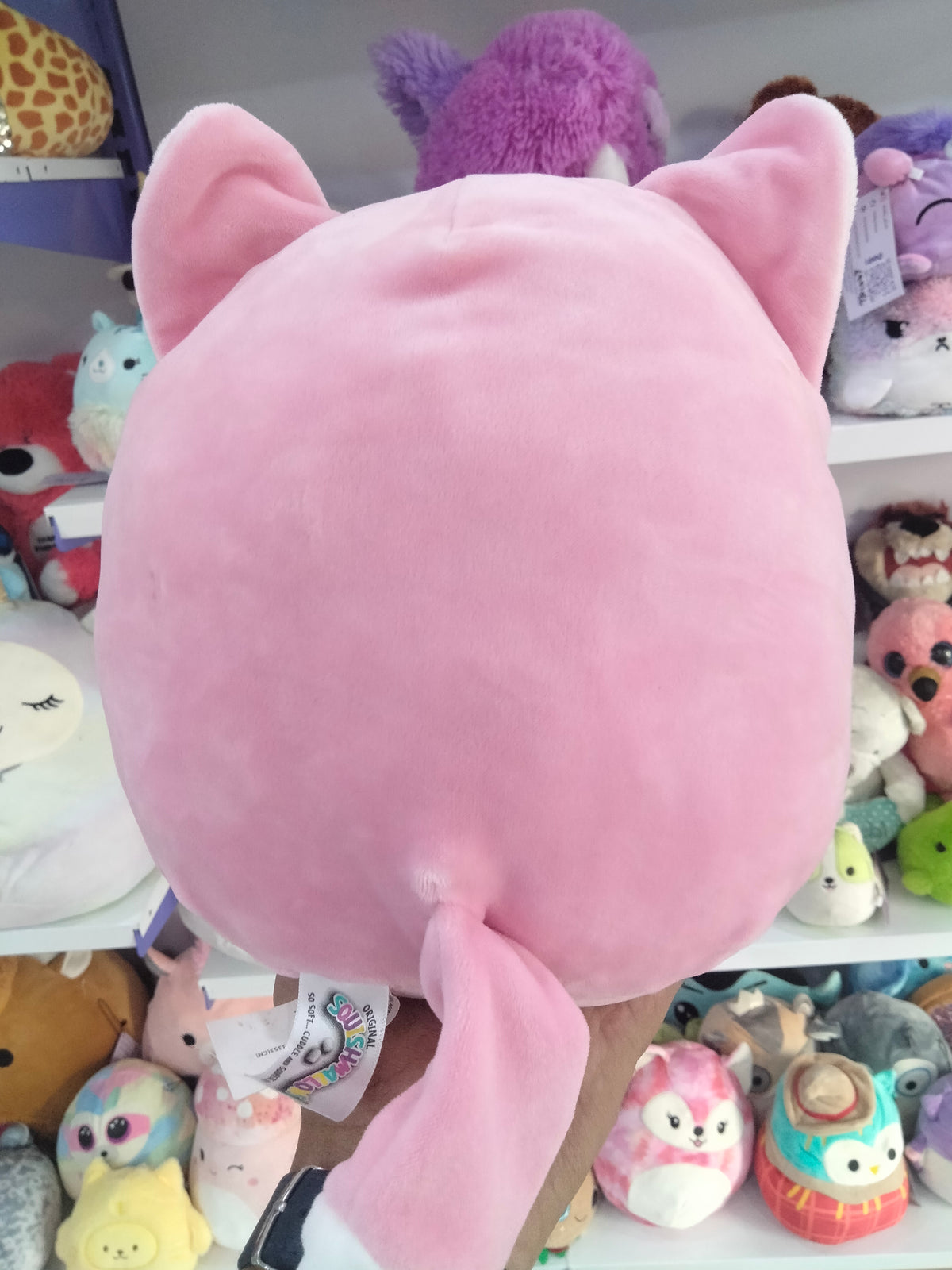 Flora the Fox 8-inch pink plush toy.