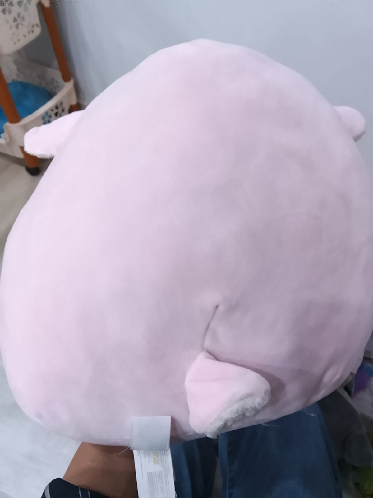 Squishmallows Elsa the Pink Lamb plush.