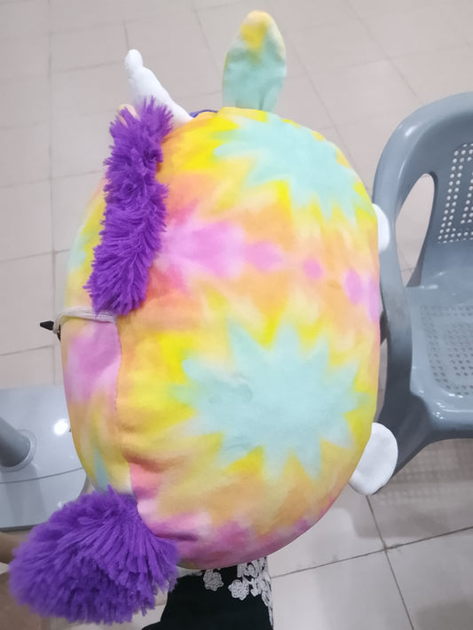 Fiesta Tie-Dye Rainbow Unicorn pillow plush stuffed animal colorful pastel tie-dye pattern and a purple mane.