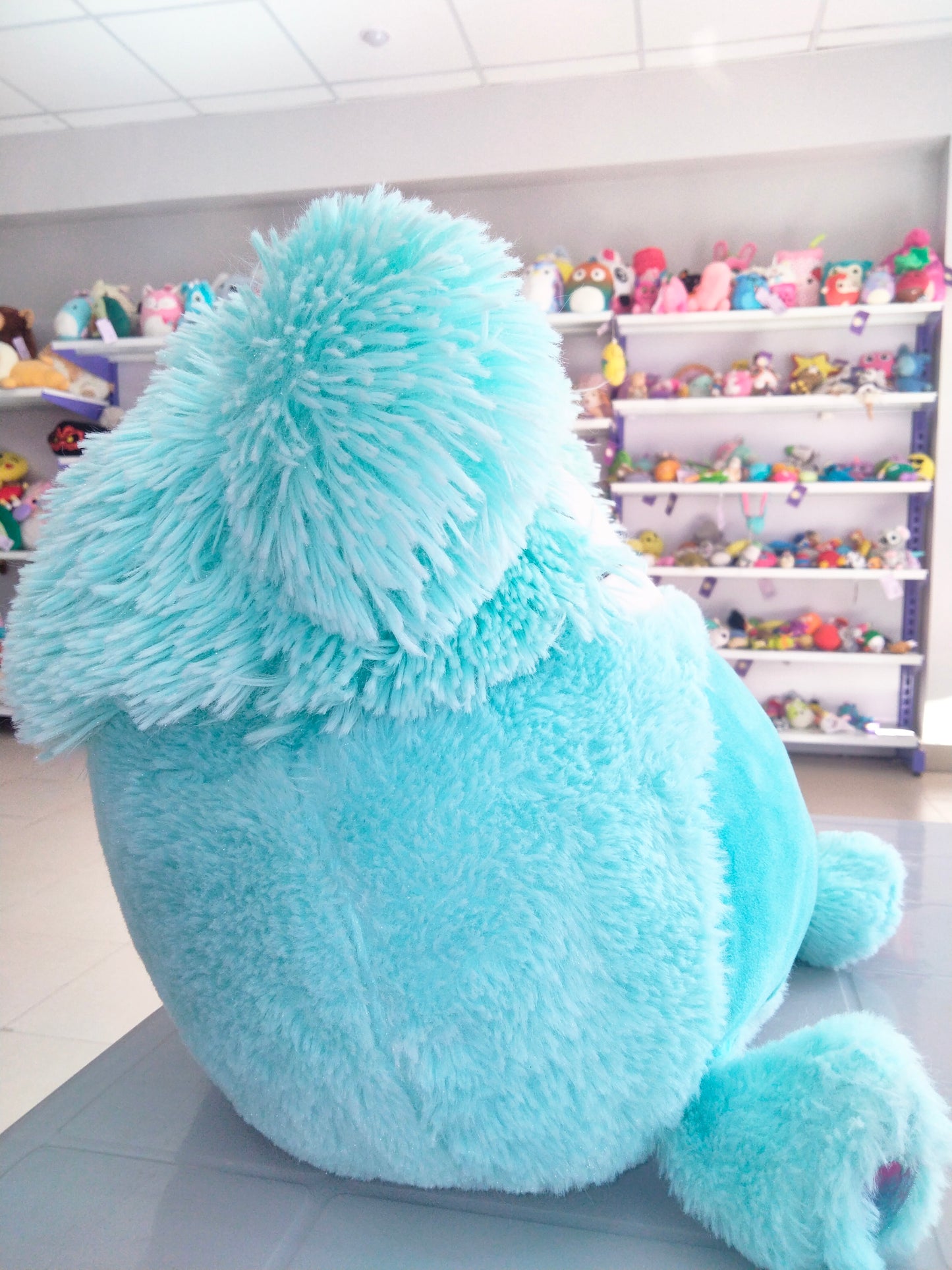 Squishmallows plush toy, specifically Joelle the Bigfoot