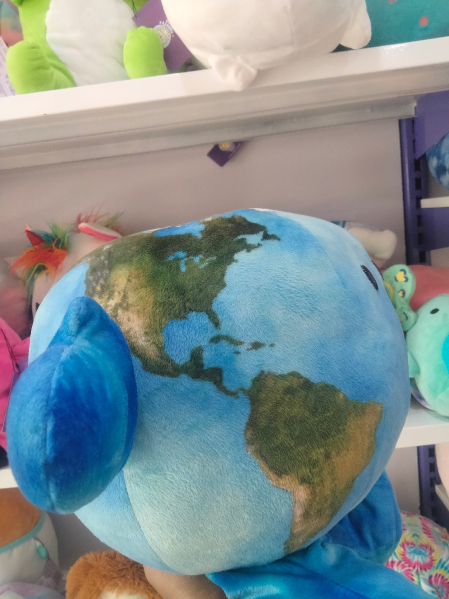 Our Precious Planet Buddy" plush toy by Celestial Buddies.