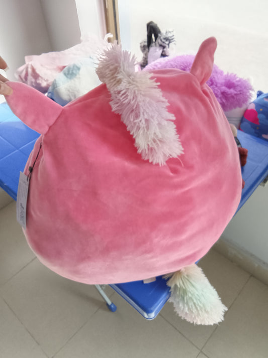 Kellytoy Squishmallows Sena the Pink Unicorn plush toy, soft pink exterior and a rainbow horn.