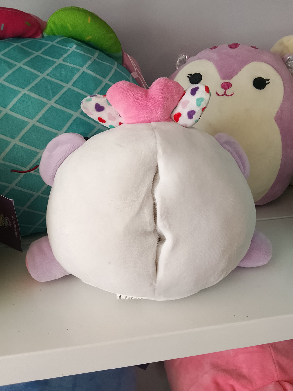 WowWee Ploosh Kissimal interactive plush toy.