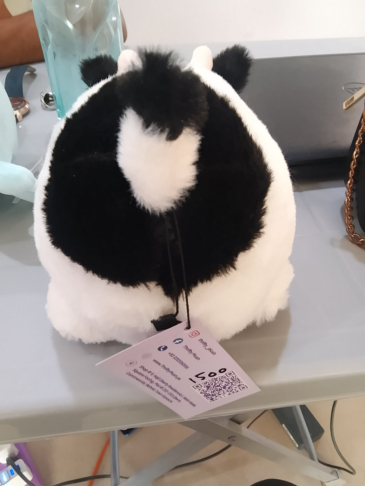 Aurora Spudsters Tutie Cow plush, designed with a rounded, potato-like shape.