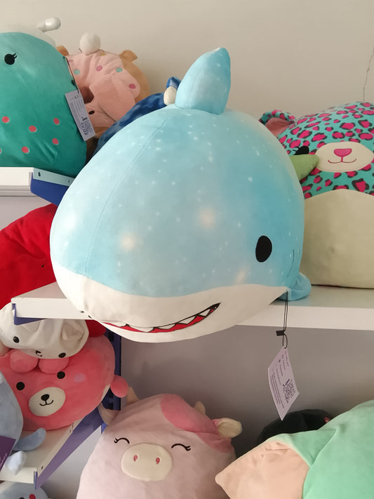 Squishmallows plush toy featuring the character Santos the Shark.