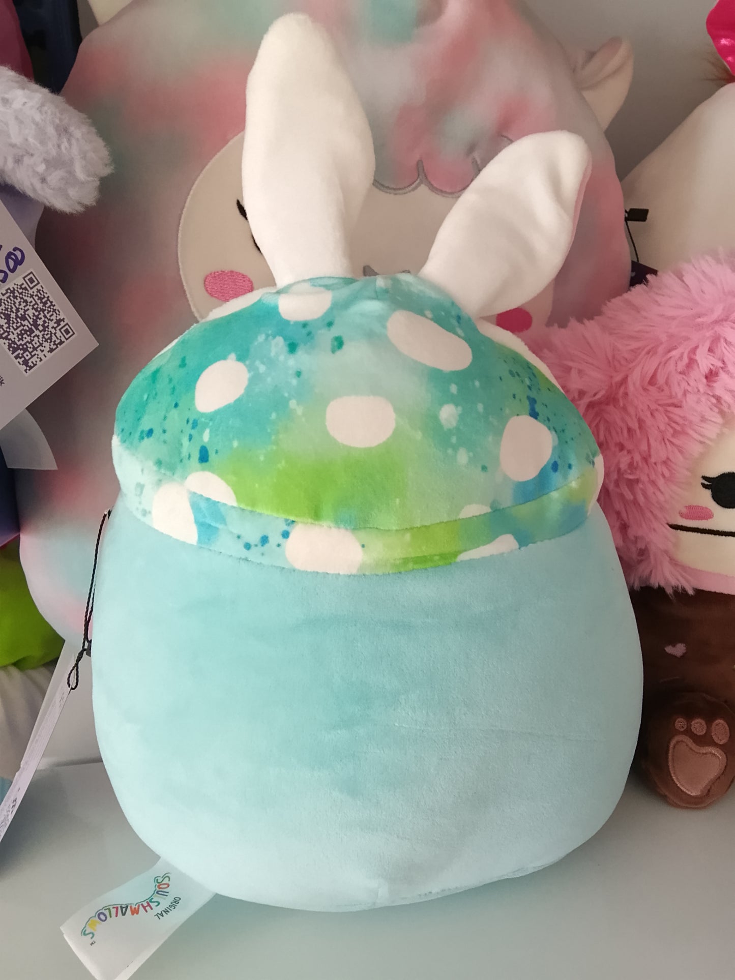 Squishmallows Mully the Teal Mushroom plush toy with bunny ears.