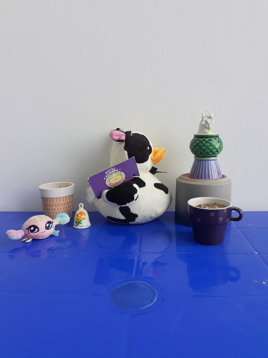 showcases a Plushie hybrid Of A Cow And A Duck