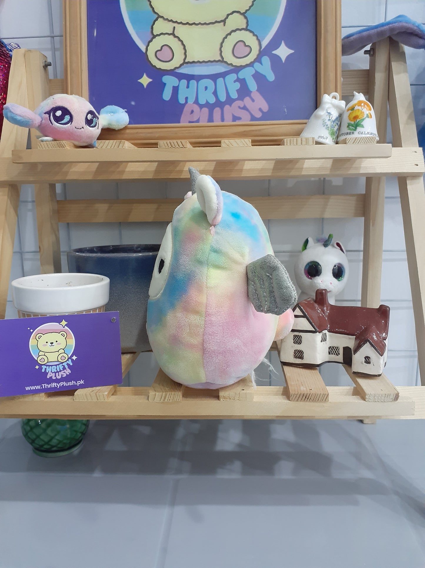 Squishmallow Named Lucy-May, A Rainbow Tie-Dye Llamacorn Plushie