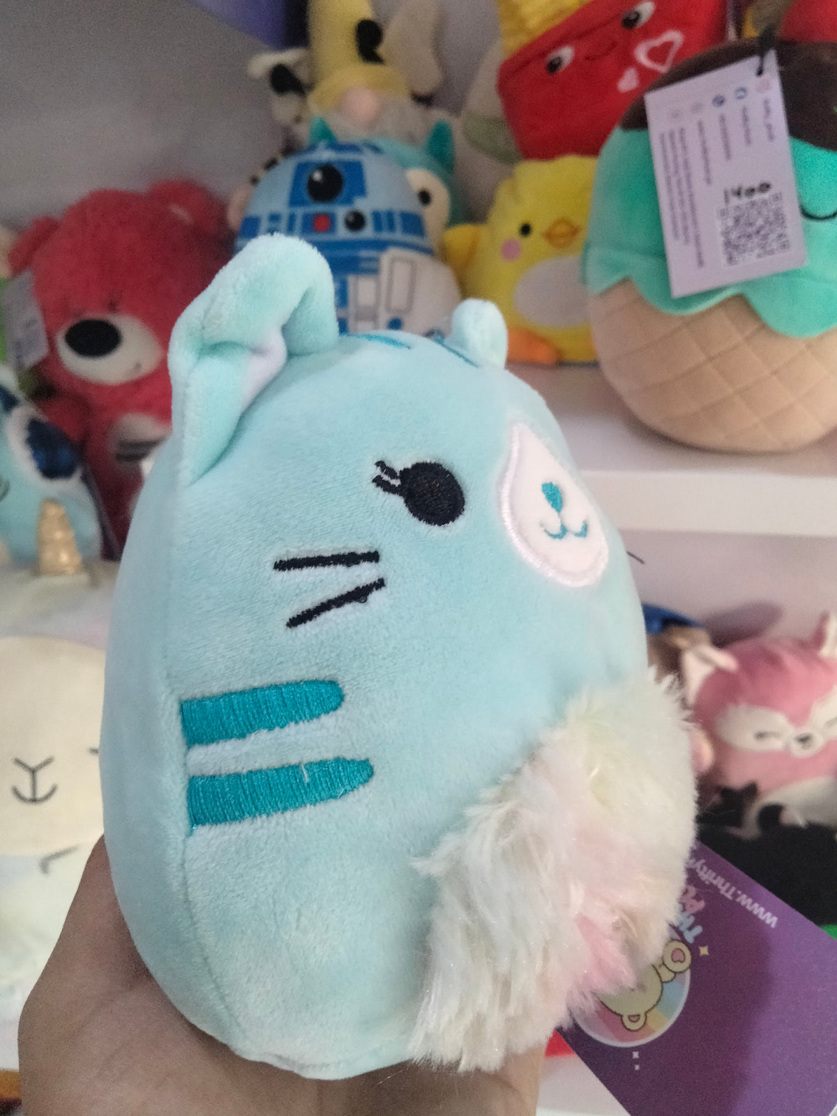 Squishmallows Corinna the Cat 5-inch plush.