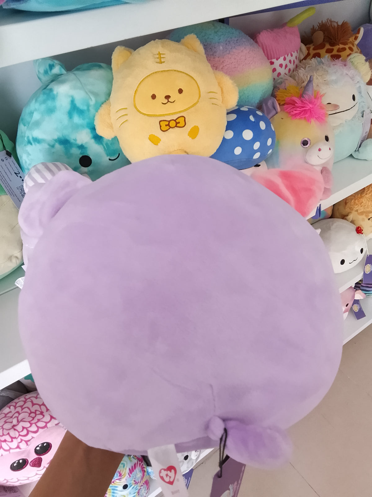 Ty Squish-A-Boo Bitsy purple dog plush toy.