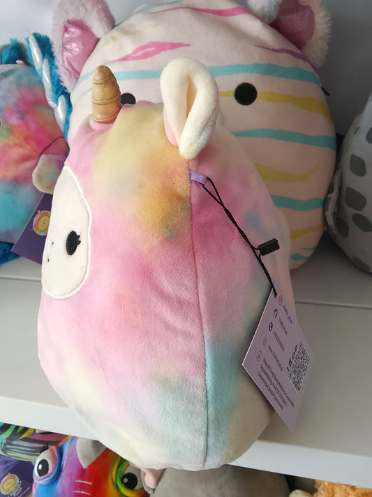 Squishmallows Lucinda the Llamacorn plush toy, featuring a rainbow tie-dye design.