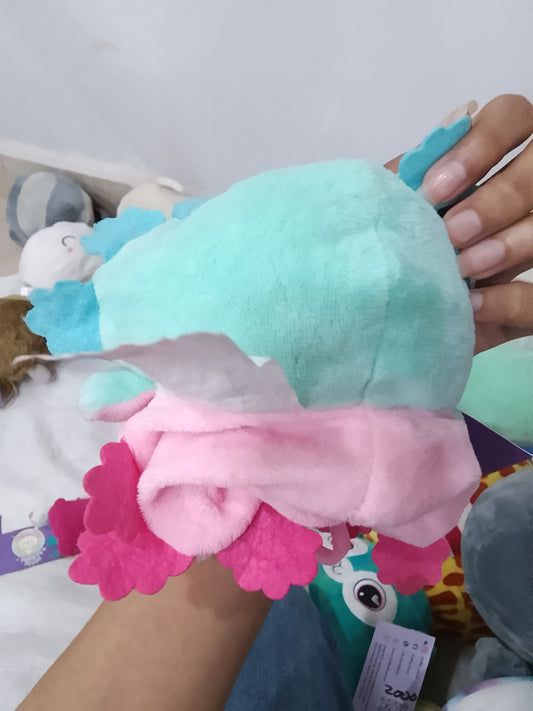 TeeTurtle Reversible Axolotl Plushie in aqua and pink colors.