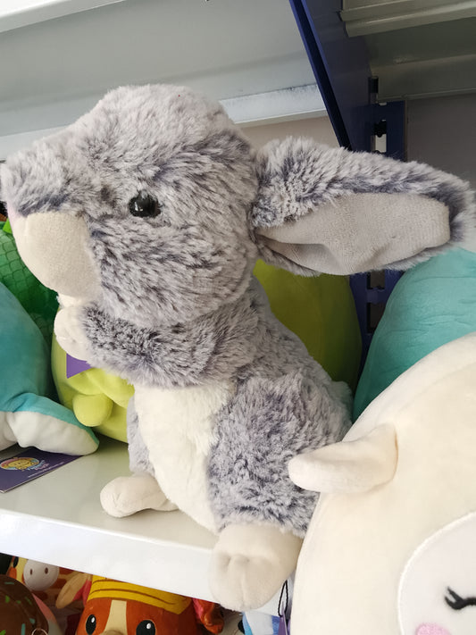 Grey bunny rabbit plush toy.