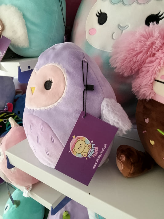 Squishmallows Scarlito the Barn Owl plush toy.