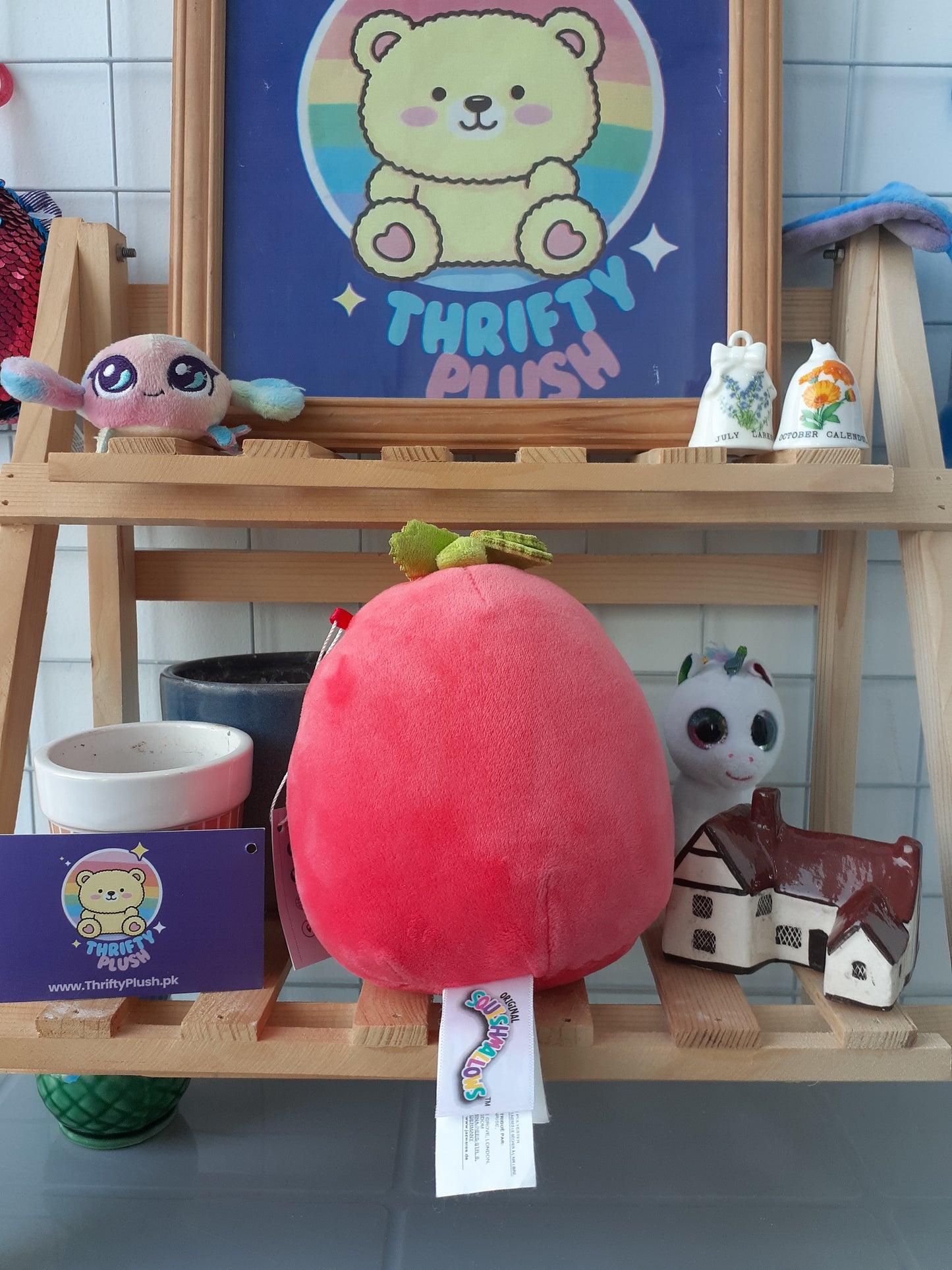 Squishmallow, Specifically The 8-Inch Scarlet The Strawberry.
