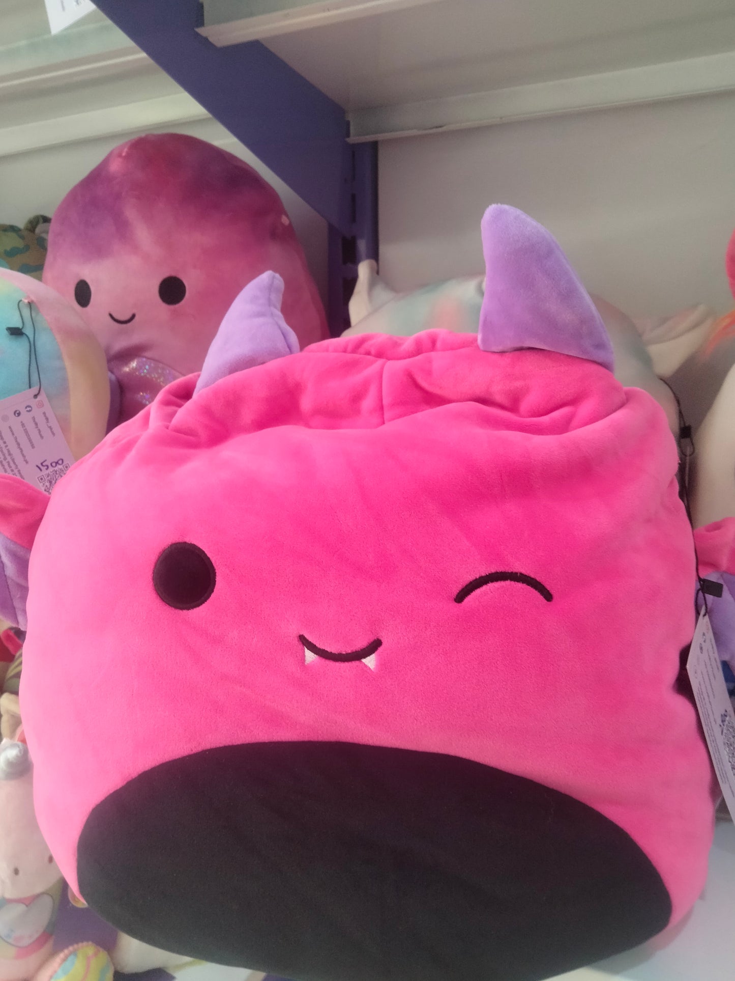 Wakisha the Neon Pink Devil Squishmallow.