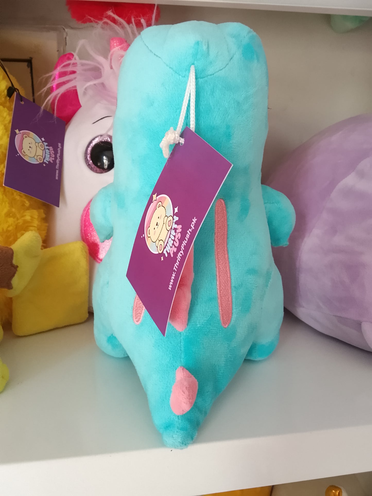 Totodile plush toy, a popular character from the Pokémon franchise.