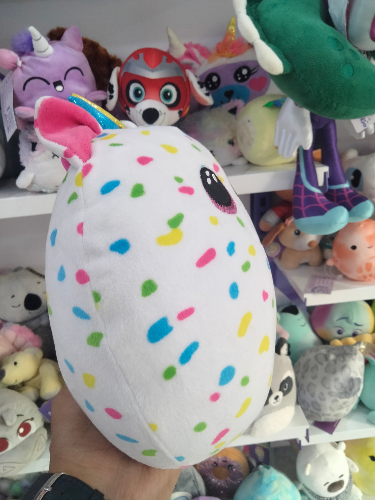 Boos Harmonie the White Unicorn plush pillow.