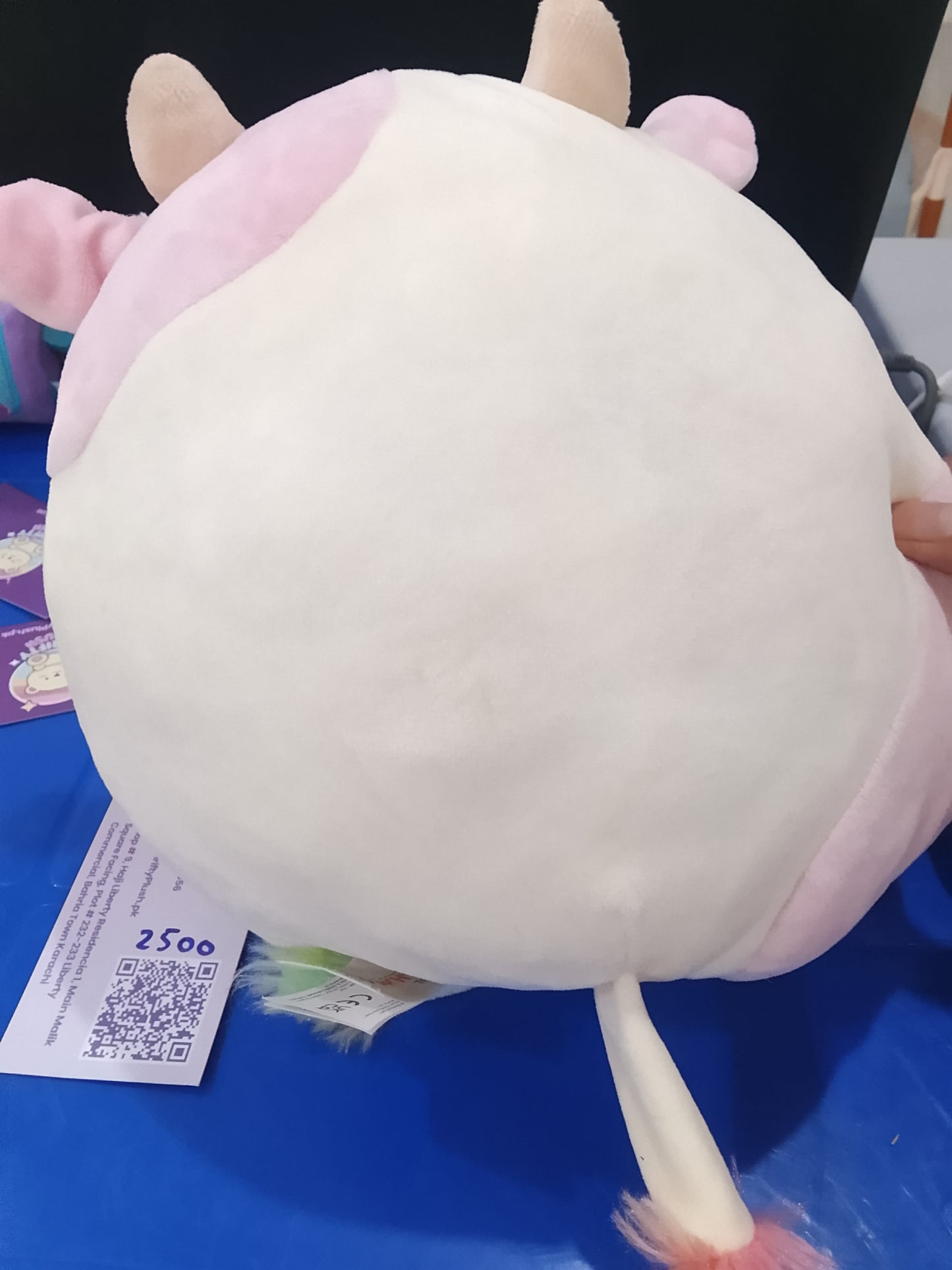 Reversible Caedia the Cow from the Squishmallows brand.