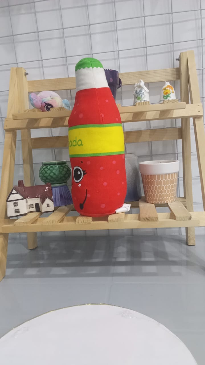 Plushie Resembling A Bottle Of Oranżada,