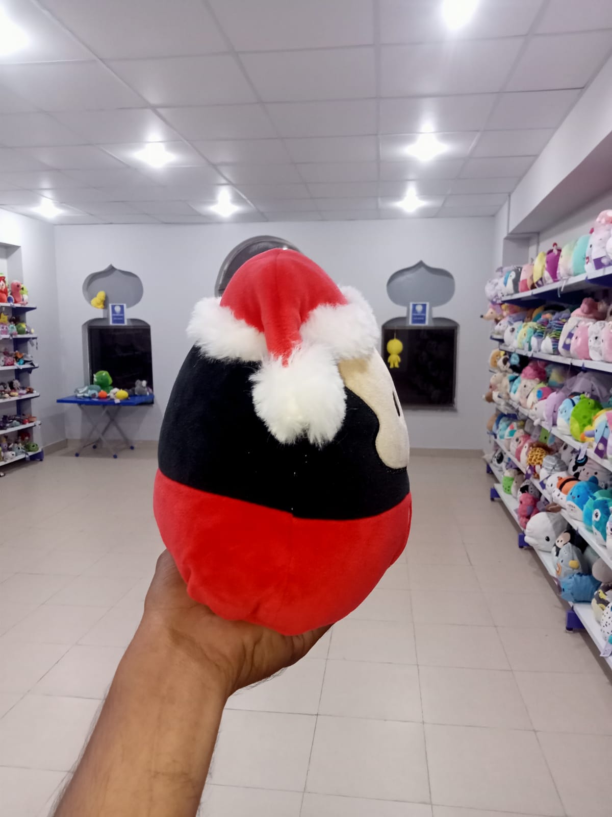 Santa Mickey Mouse Squishmallow.