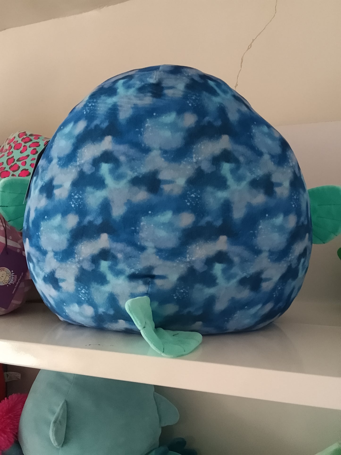 Squishmallows plush toy of Deezo the Anglerfish.