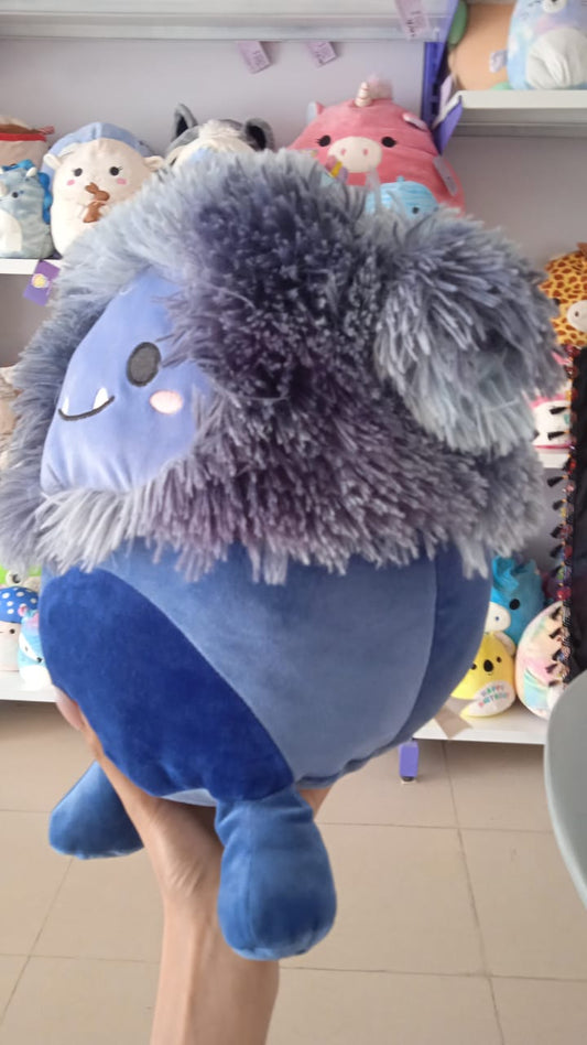 Dani the Navy Blue Bigfoot from the Squishmallows brand.