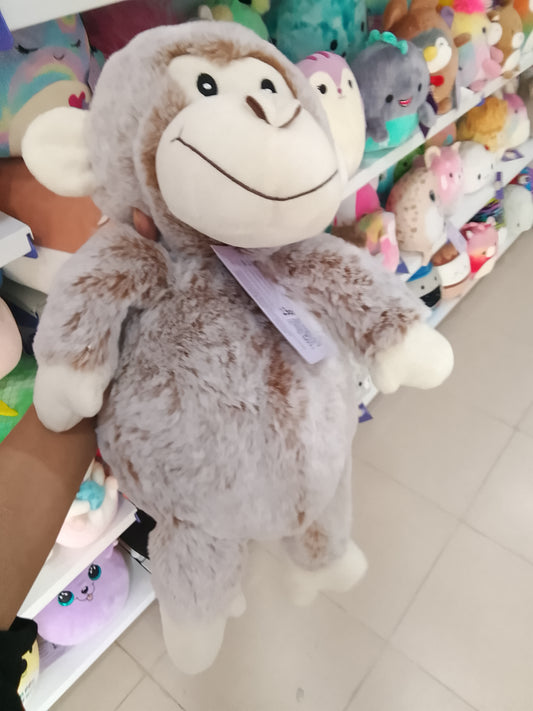 Kid Connection gray and white monkey plush toy.