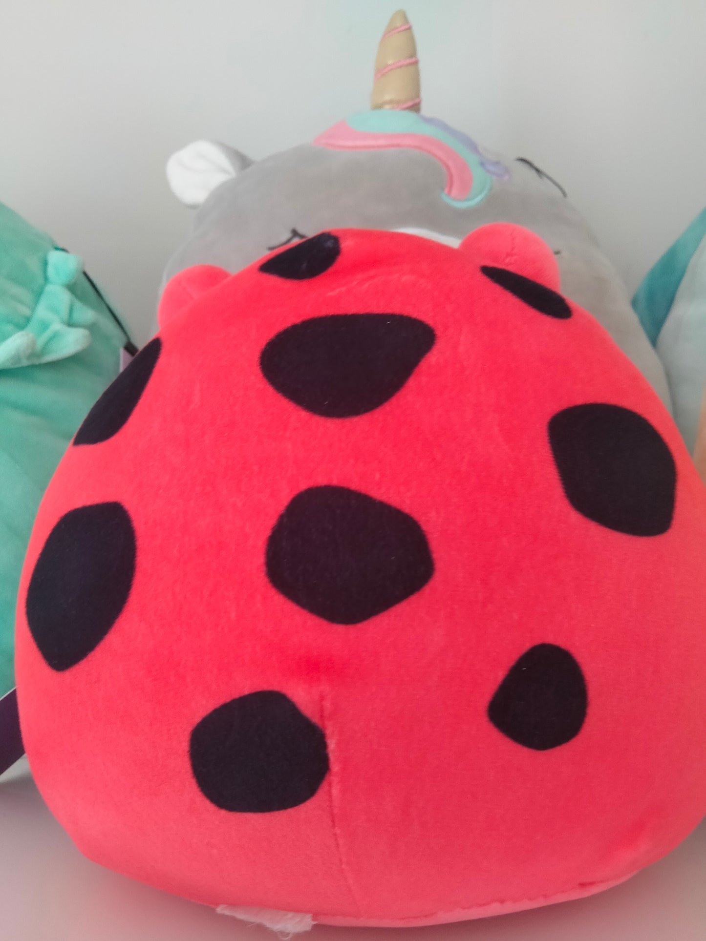Squishmallows plush toy featuring the character Obu the Red Frog.