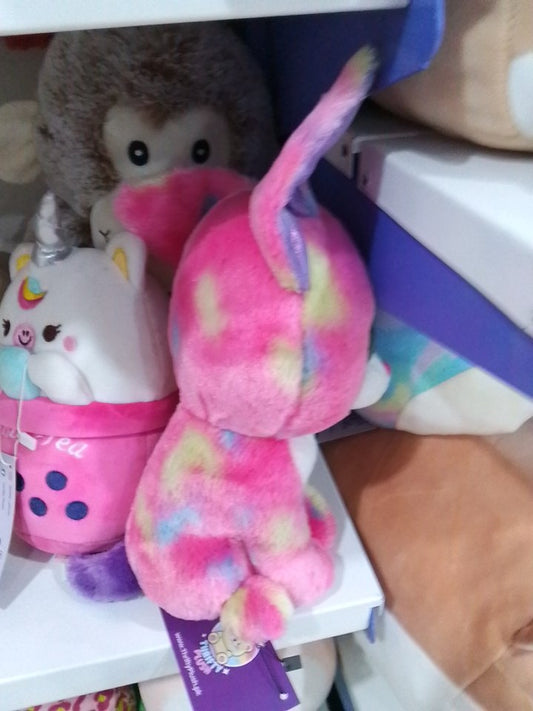 Ty Beanie Boos Cancun Chihuahua dog plush toy pink, yellow, and blue tie-dye fur and purple glitter eyes