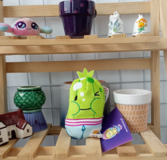 Cats vs Pickles" plush toy,